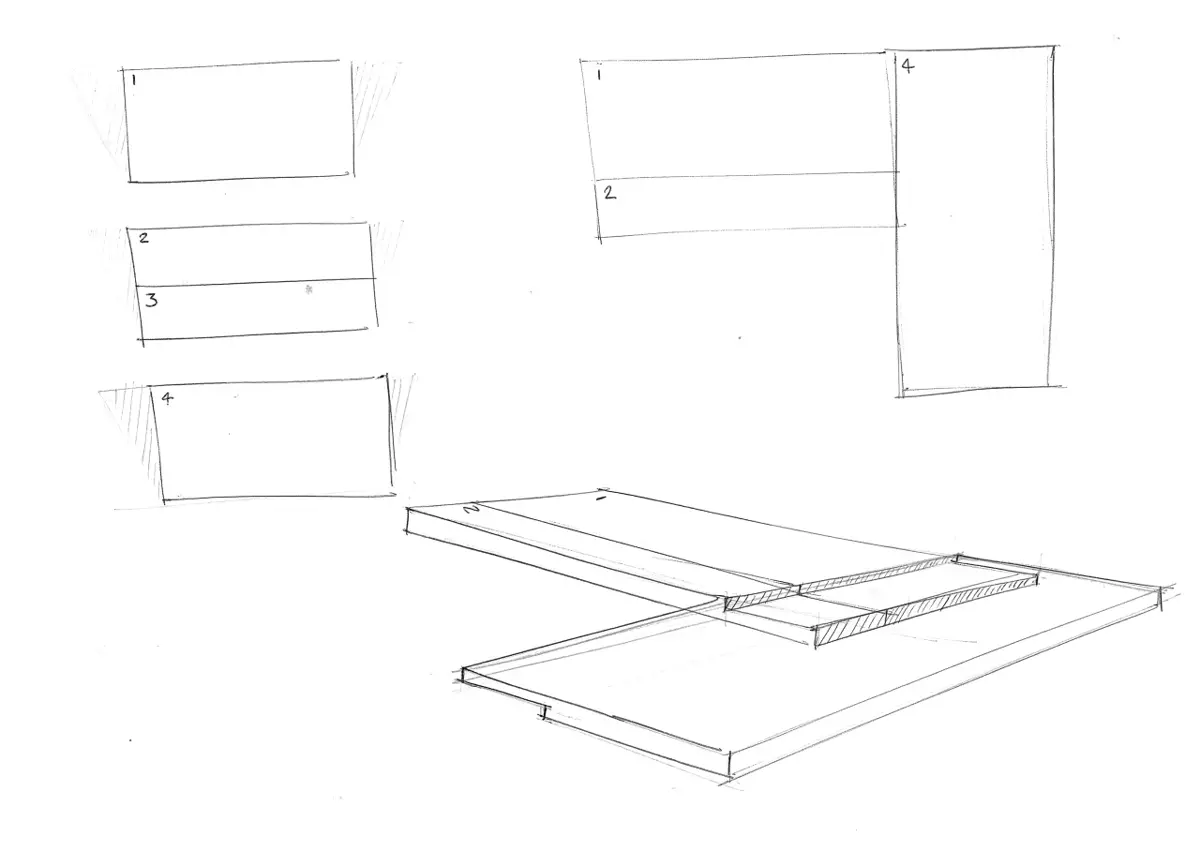 A line drawing showing the overall plan view of a corner desk design.
