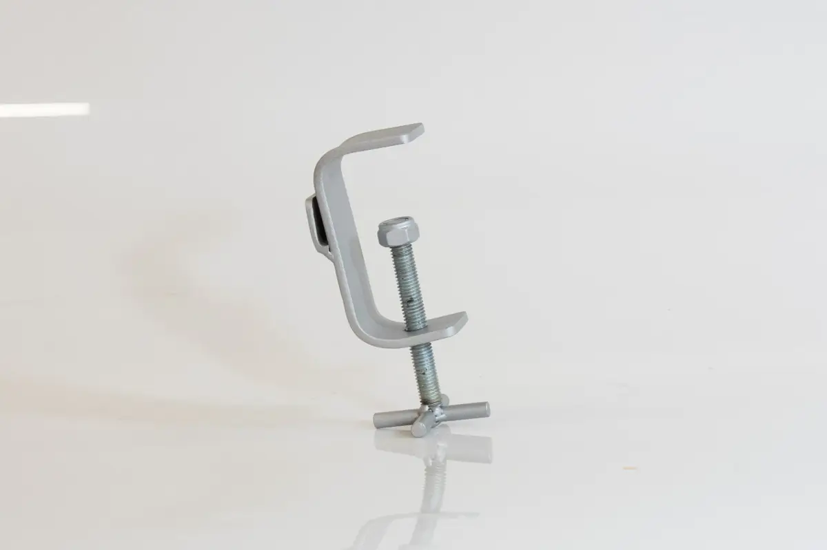 A fabricated metal prototype component for the 'Scrappy' composting system, shown assembled on a white surface.
